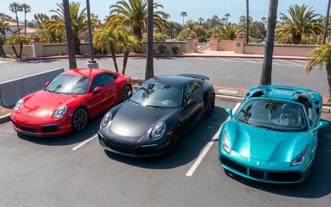 Three sports cars in red, black and teal vinyl wrap film in San Diego