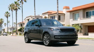 Grey luxury SUV with a blacked-out chrome delete on a San Diego street